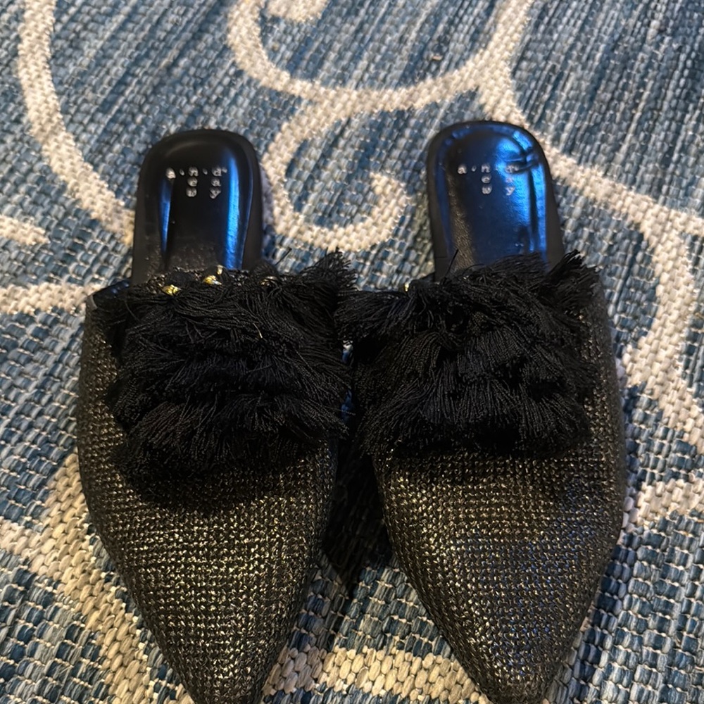 Black Textured Mules with Fringe by a new day